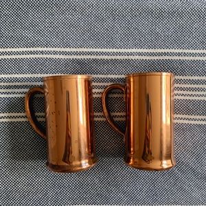 Pair of vintage copper mugs